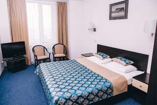 Гостиница Флагман Омск Стандартный двухместный номер с 1 кроватью или 2 отдельными кроватями-14